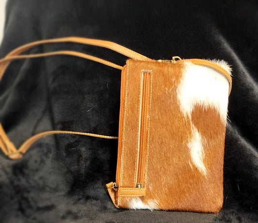 Cross body cowhide and leather phone bag